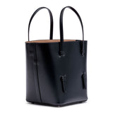 Navy leather tote with studded floral strap