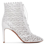 White laser cut lace-up ankle boots