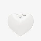 Heart-shaped white pillow on a white background