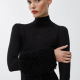 Faux fur sleeved knit top
