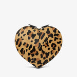 Heart-shaped clutch with leopard print design on a white background