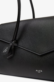 Le Teckel Flap black bag