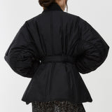 Belted black bomber jacket