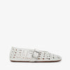 White perforated flat shoe on a white background
