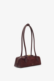 Le Teckel small dark red bag