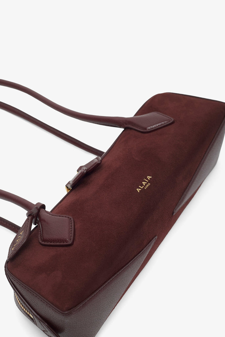 Le Teckel small dark red bag