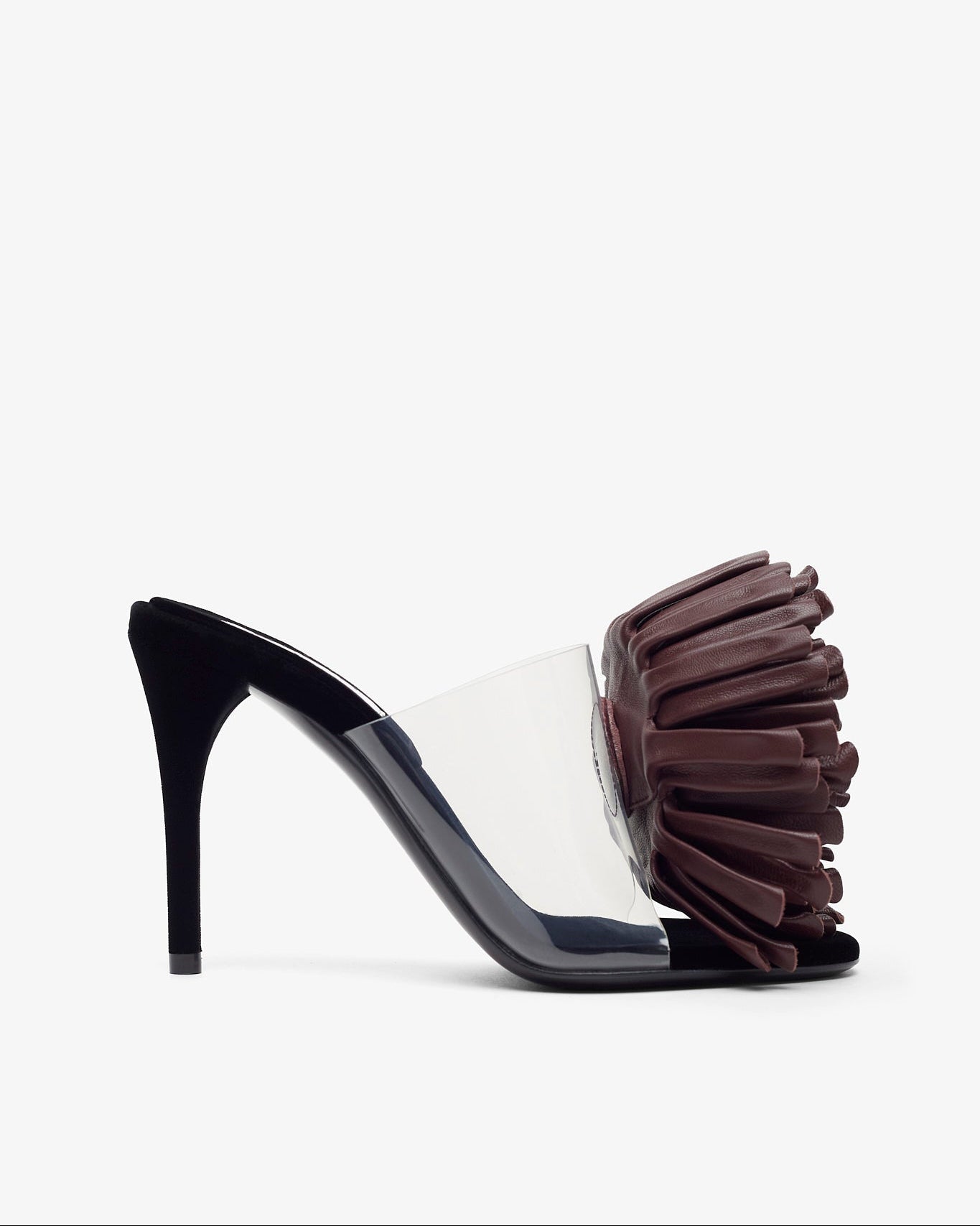 High-heeled shoe with a decorative flower on a white background
