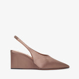 Brown wedge sandal on a white background