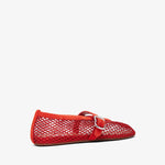 Red mesh ballerina shoe on a white background