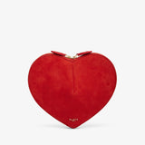Red heart-shaped clutch bag on a light gray background