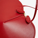 Le Coeur orange suede crossbody bag
