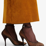 Transparent amber strappy pumps