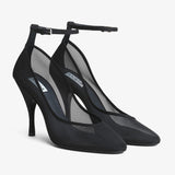 Transparent black strappy pumps