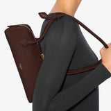 Le teckel small brown suede bag