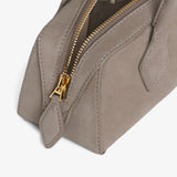 Le teckel small light taupe suede bag