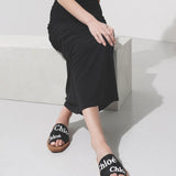 Woody black slide sandals