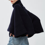 Short dark blue turtleneck cape