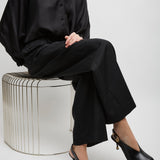 Andrea black slingback pumps