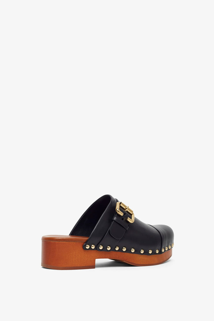 Jeannette black leather clogs