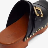 Jeannette black leather clogs