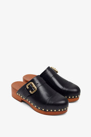 Jeannette black leather clogs