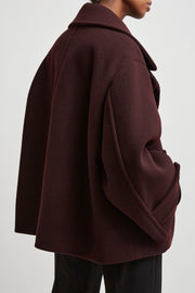 Double-breasted oversized short coat