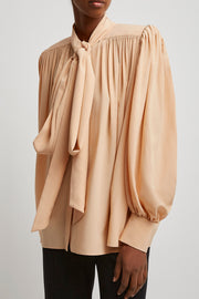 Oversized gathered lavalliere blouse