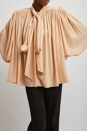 Oversized gathered lavalliere blouse