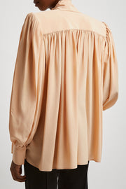Oversized gathered lavalliere blouse