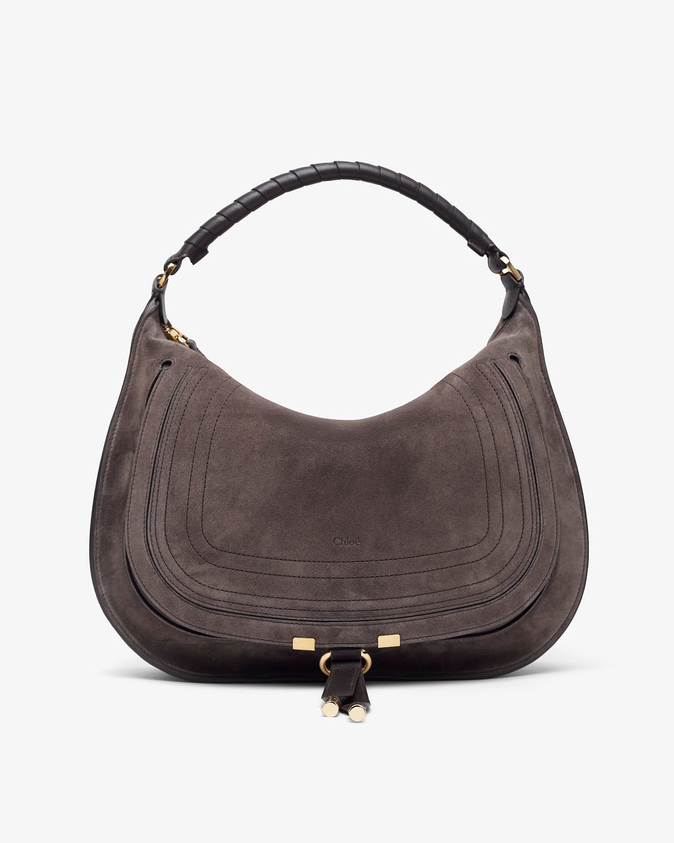Brown suede handbag with gold hardware on a white background