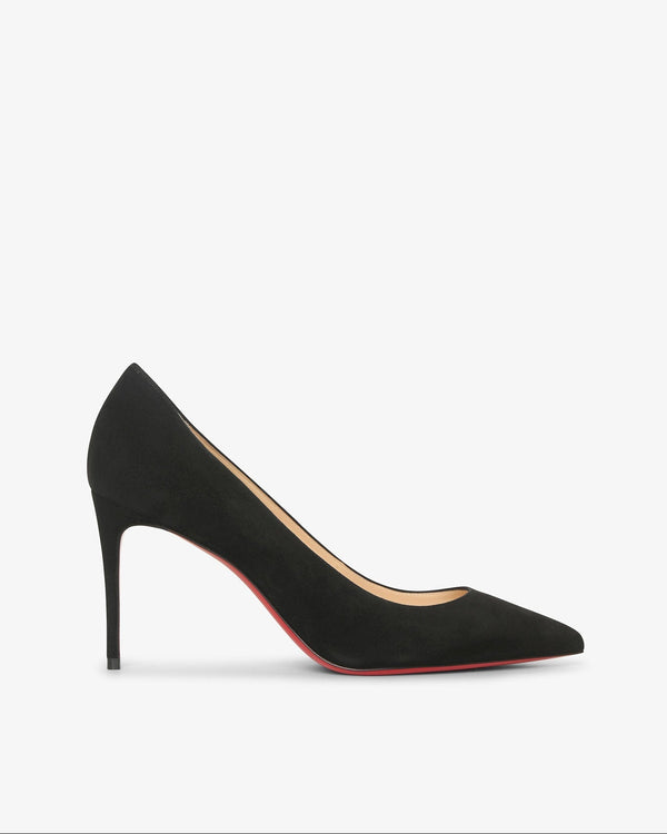 Navy blue shoe with a strap on a light gray background