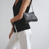 Loubitwist black strass clutch