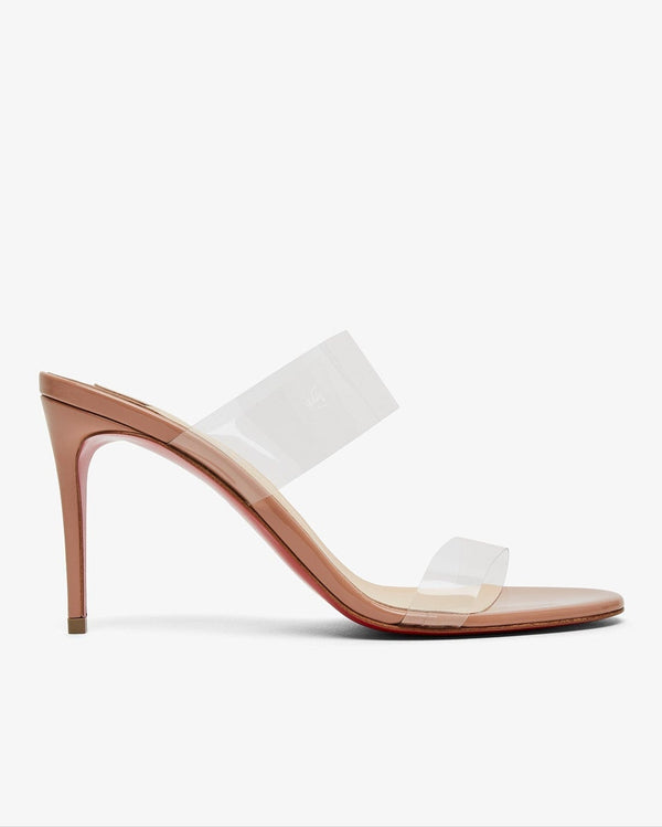 White high-heeled sandal with clear straps on a white background