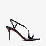 Black high-heeled sandal with red sole on a white background