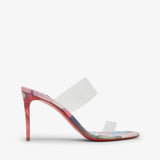 High-heeled shoe with a transparent strap on a white background