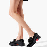Daisy spikes black patent flats