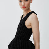 Slim fit peplum black top in waffle wool