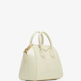 Antigona mini cream patent bag