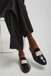 Tux black patent slippers