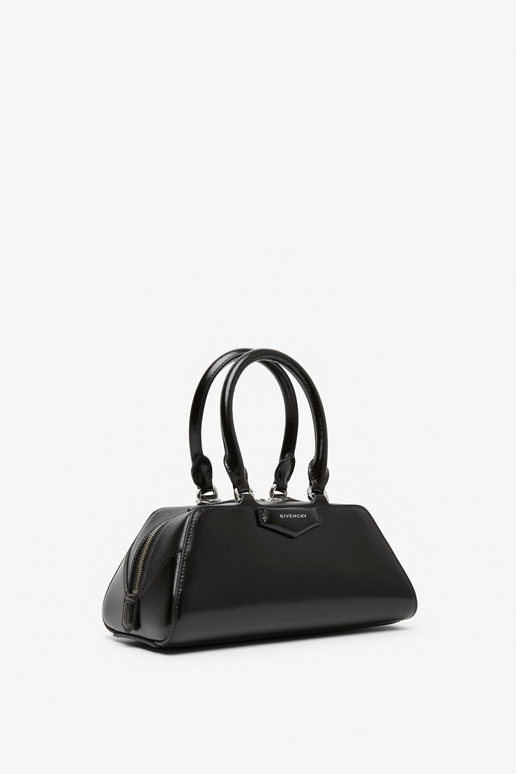 Antigona east west black mini bag