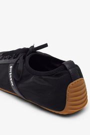Slim black sneakers