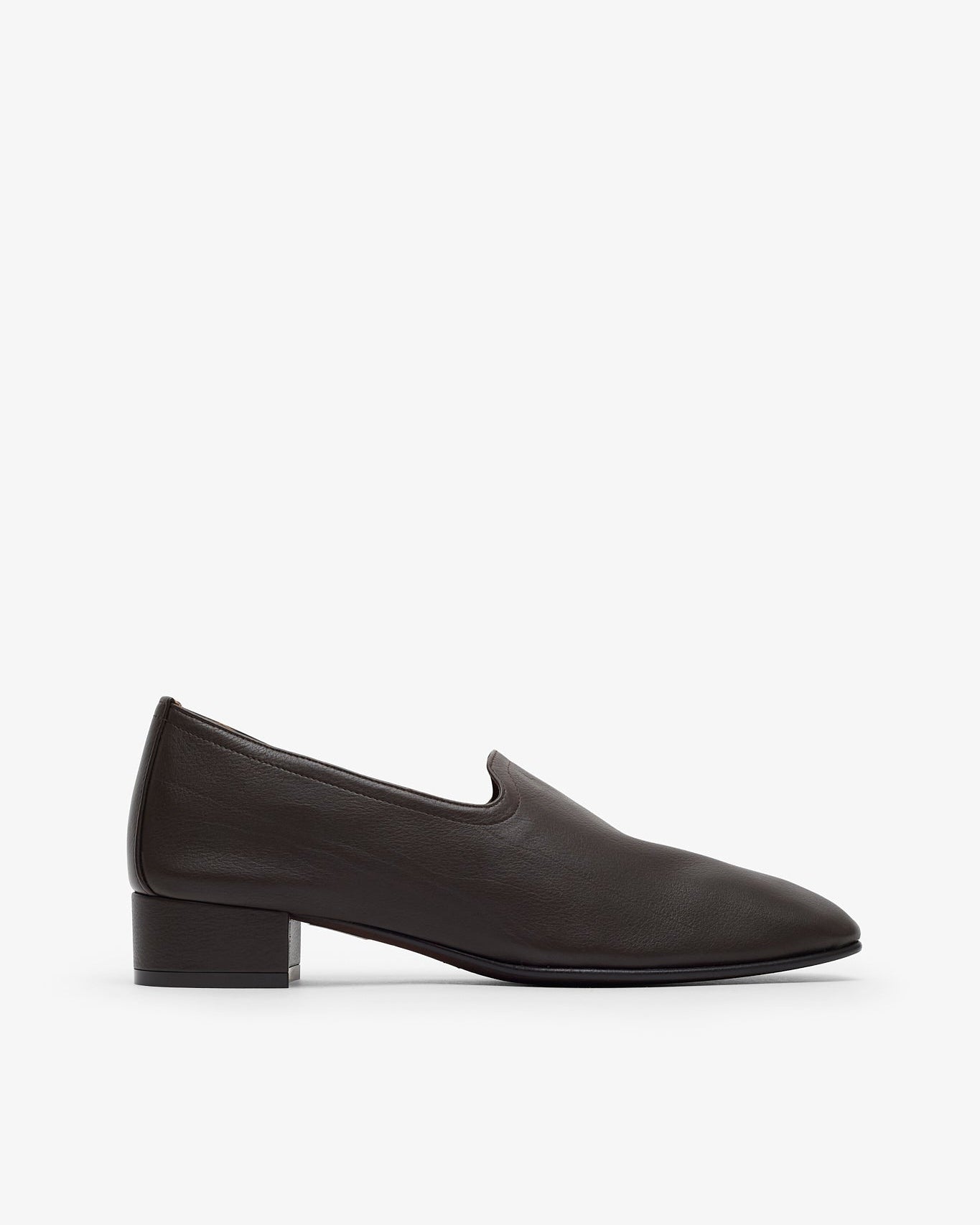 Black loafer shoe on a white background