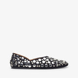 Black flat shoe with silver embellishments on a white background