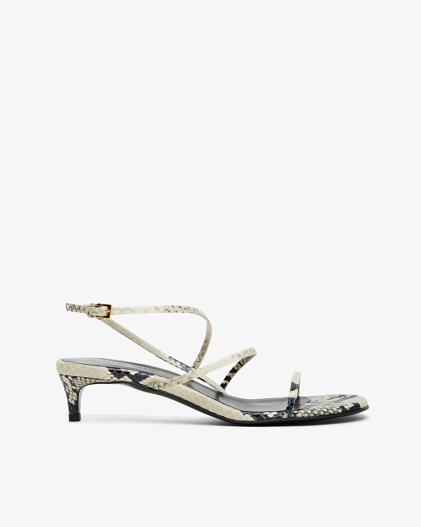 High-heeled sandal with a strap on a white background