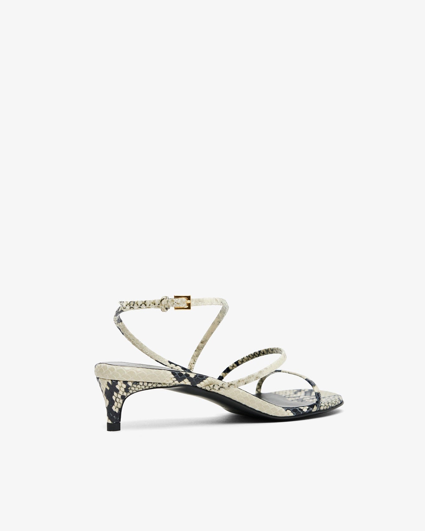 High-heeled sandal with thin straps on a white background
