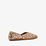 Brown flat shoe with decorative silver studs on a white background