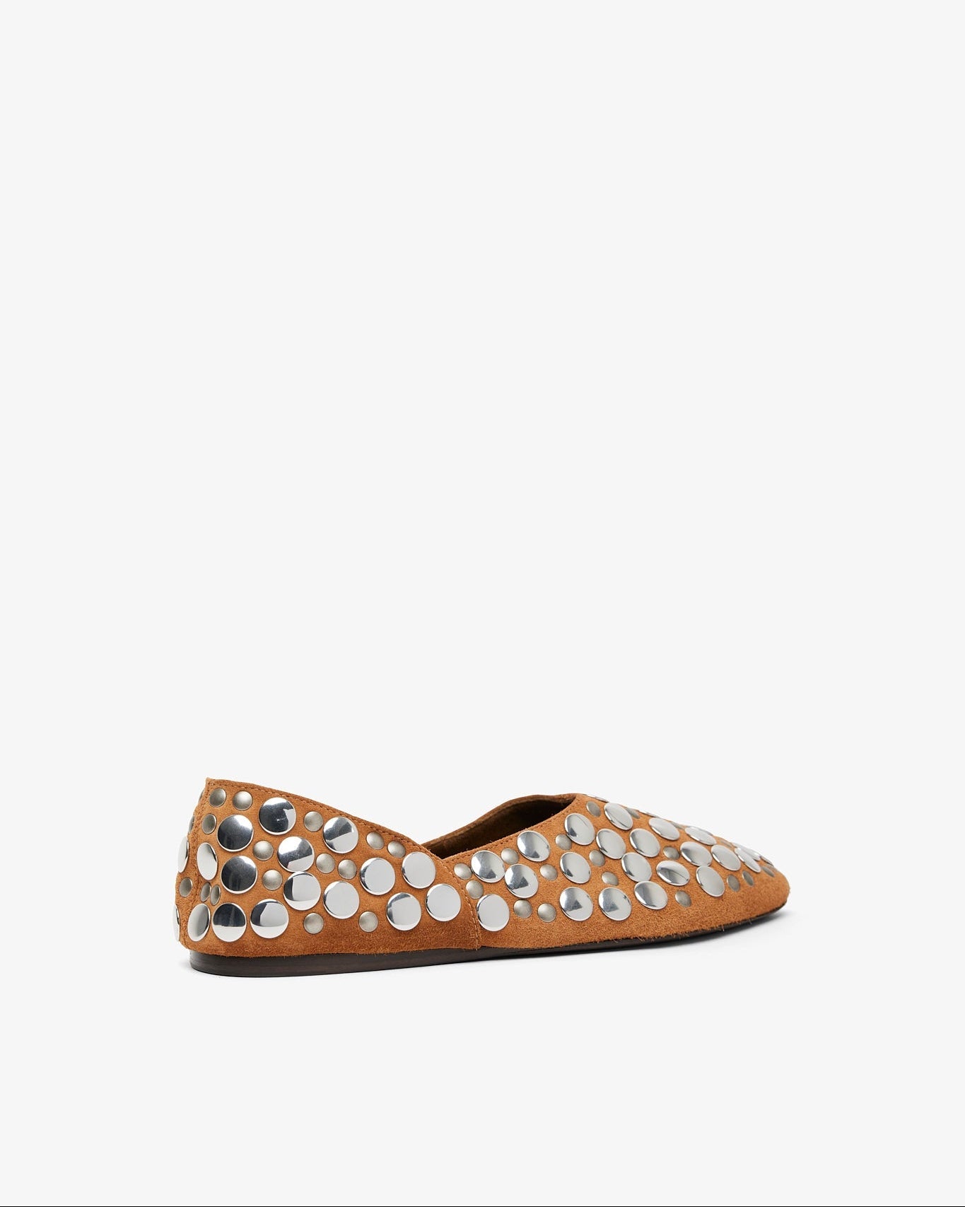 Brown flat shoe with decorative silver studs on a white background