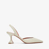 White high-heeled shoe with a minimalist design on a white background