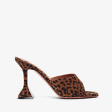 Leopard print high-heeled shoe on a white background