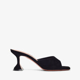 Black high-heeled shoe on a white background